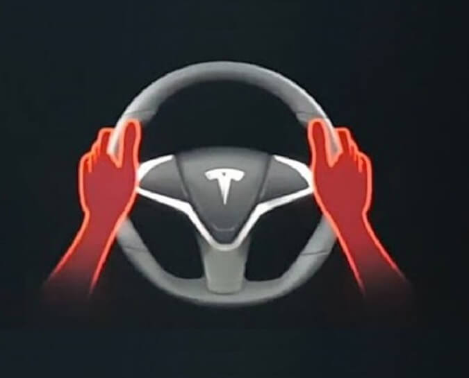 Tesla Autopilot Hold Wheel